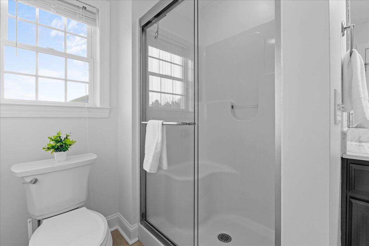 1695 Red Ln Extension Salem, VA 24153 - Photo 18 of 41 a white toilet next to a bathroom