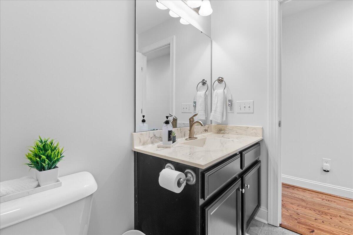1695 Red Ln Extension Salem, VA 24153 - Photo 23 of 41 a bathroom with a sink a vanity and a mirror