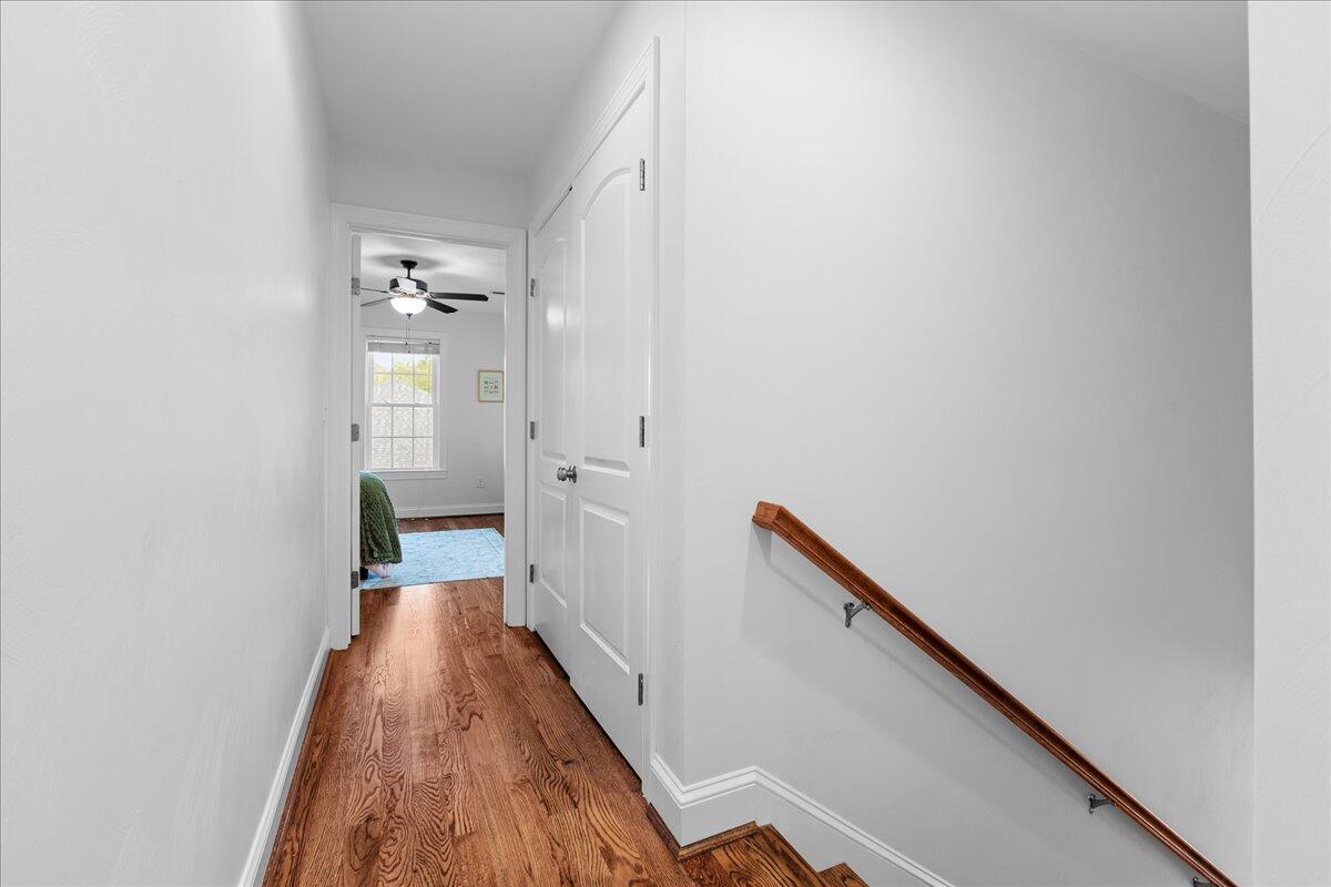 1695 Red Ln Extension Salem, VA 24153 - Photo 26 of 41 a view of a hallway with wooden floor and staircase