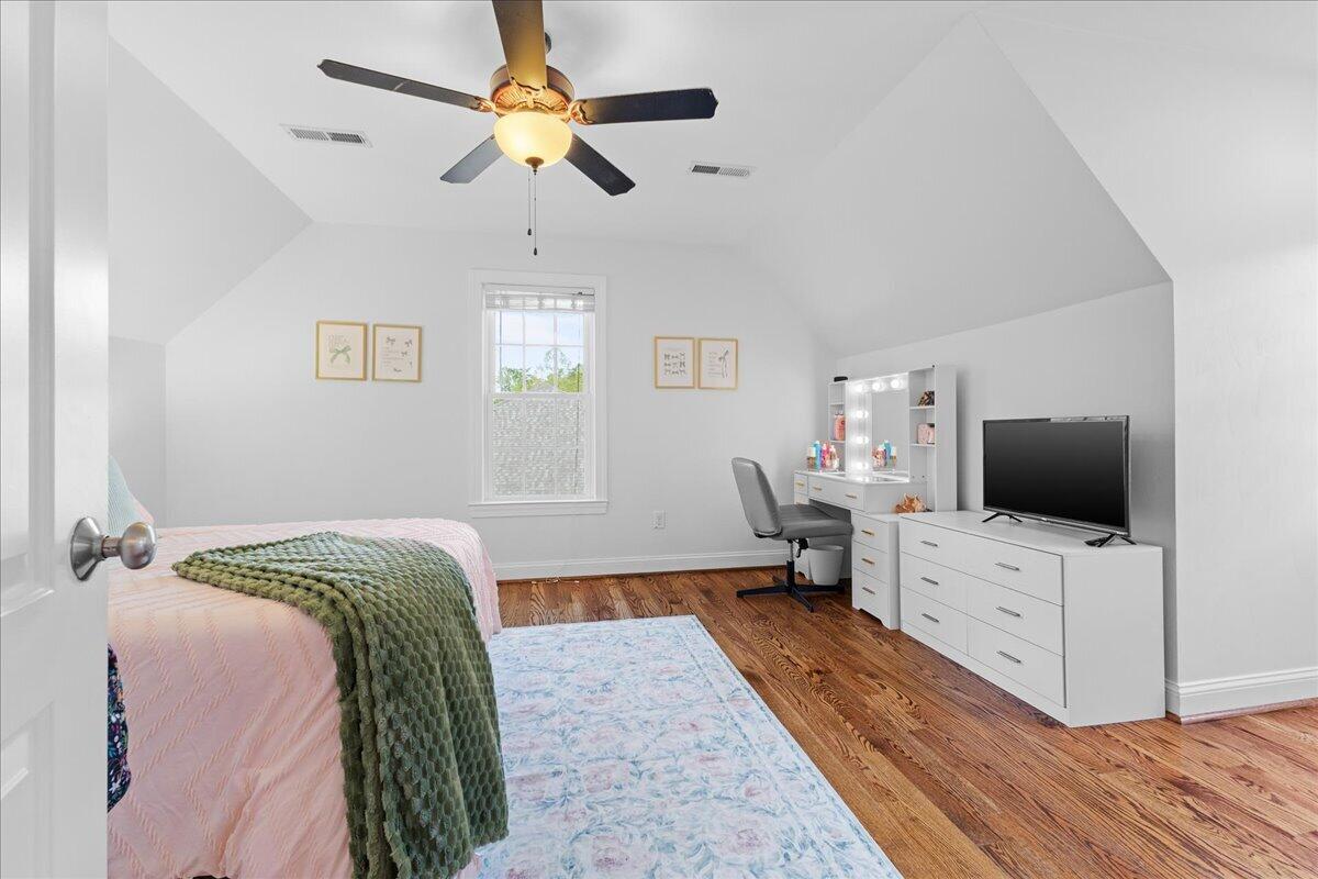 1695 Red Ln Extension Salem, VA 24153 - Photo 28 of 41 a bedroom with a bed and a flat screen tv