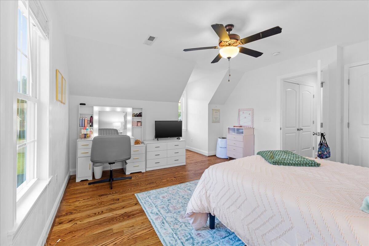 1695 Red Ln Extension Salem, VA 24153 - Photo 30 of 41 a bedroom with a bed and wooden floor