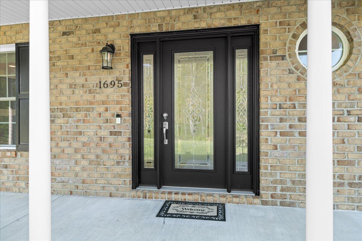 1695 Red Ln Extension Salem, VA 24153 - Photo 3 of 41 a front view of a brick house