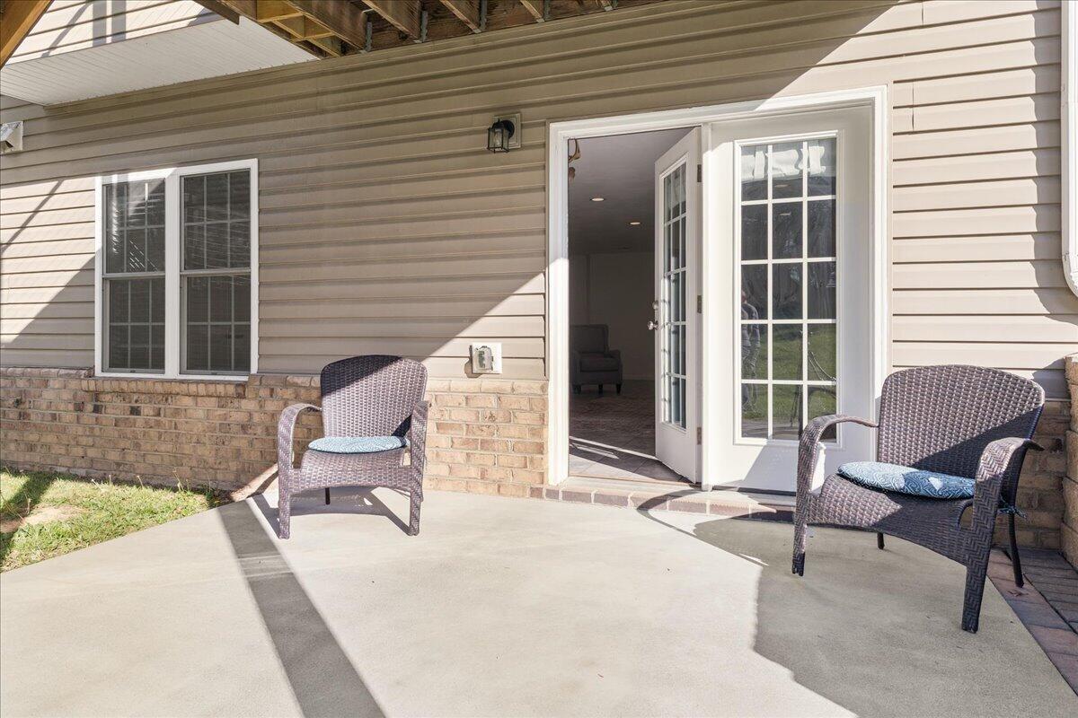1695 Red Ln Extension Salem, VA 24153 - Photo 38 of 41 a view of a patio with couple of chairs and a table