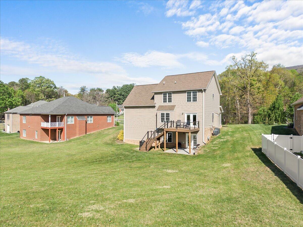 1695 Red Ln Extension Salem, VA 24153 - Photo 41 of 41 an white house with garden and tall trees