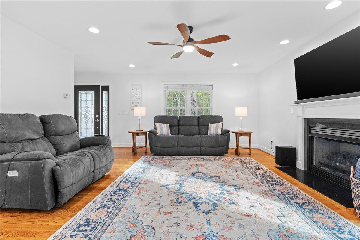 1695 Red Ln Extension Salem, VA 24153 - Photo 6 of 41 a living room with furniture a flat screen tv and a fireplace