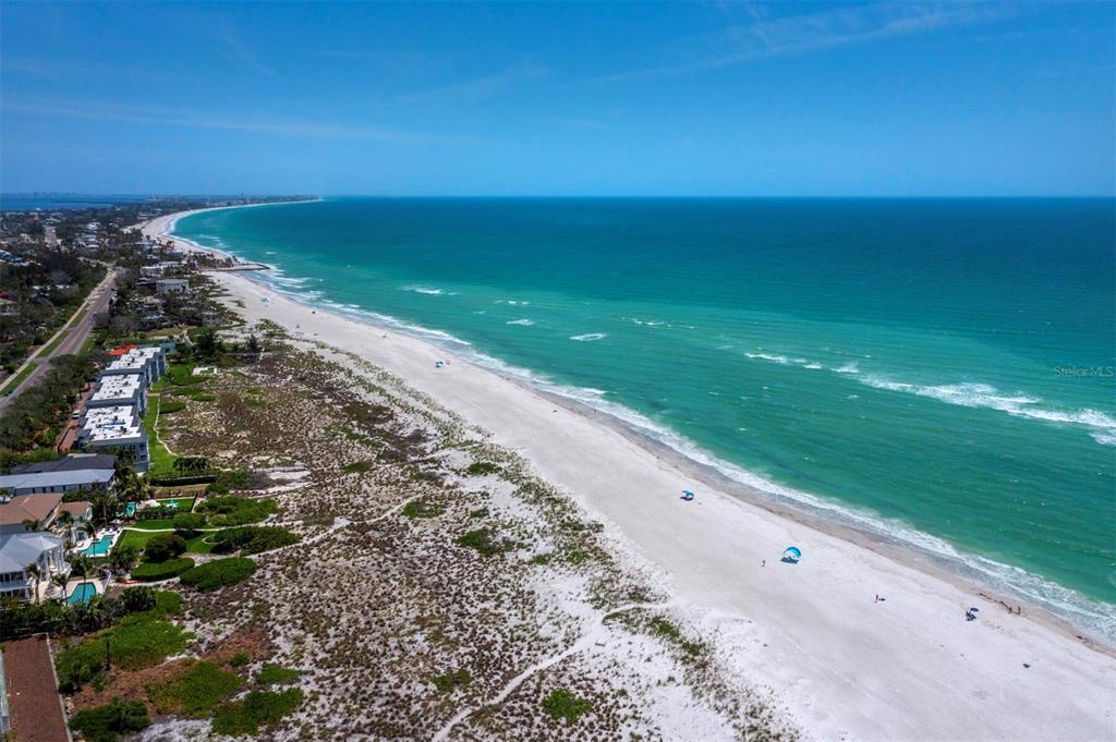 641 Broadway Street Longboat Key, FL 34228 - Photo 28 of 28 a view of an ocean beach with a building in the background