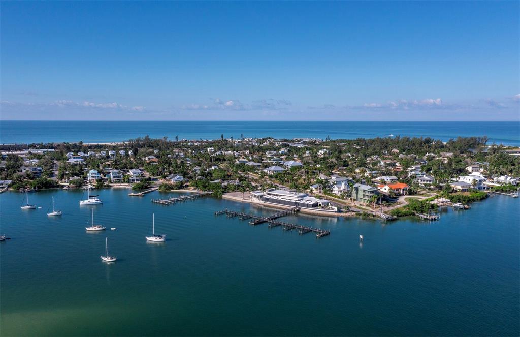 641 Broadway Street Longboat Key, FL 34228 - Photo 9 of 28 an aerial view of ocean and residential houses with outdoor space
