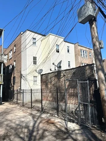 a view of a house with a street