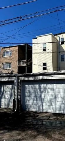 a kitchen with stainless steel appliances wooden cabinets and a stove top oven