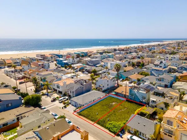 an aerial view of a building with floor to ceiling window