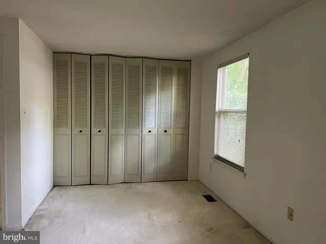 a bathroom with a toilet and a sink