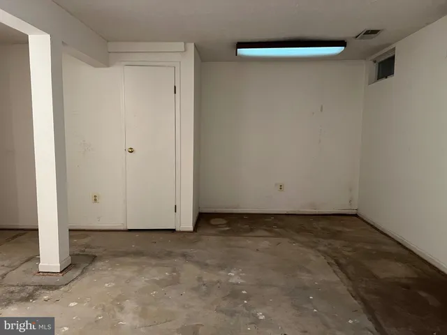 a view of a room with racks on the wall