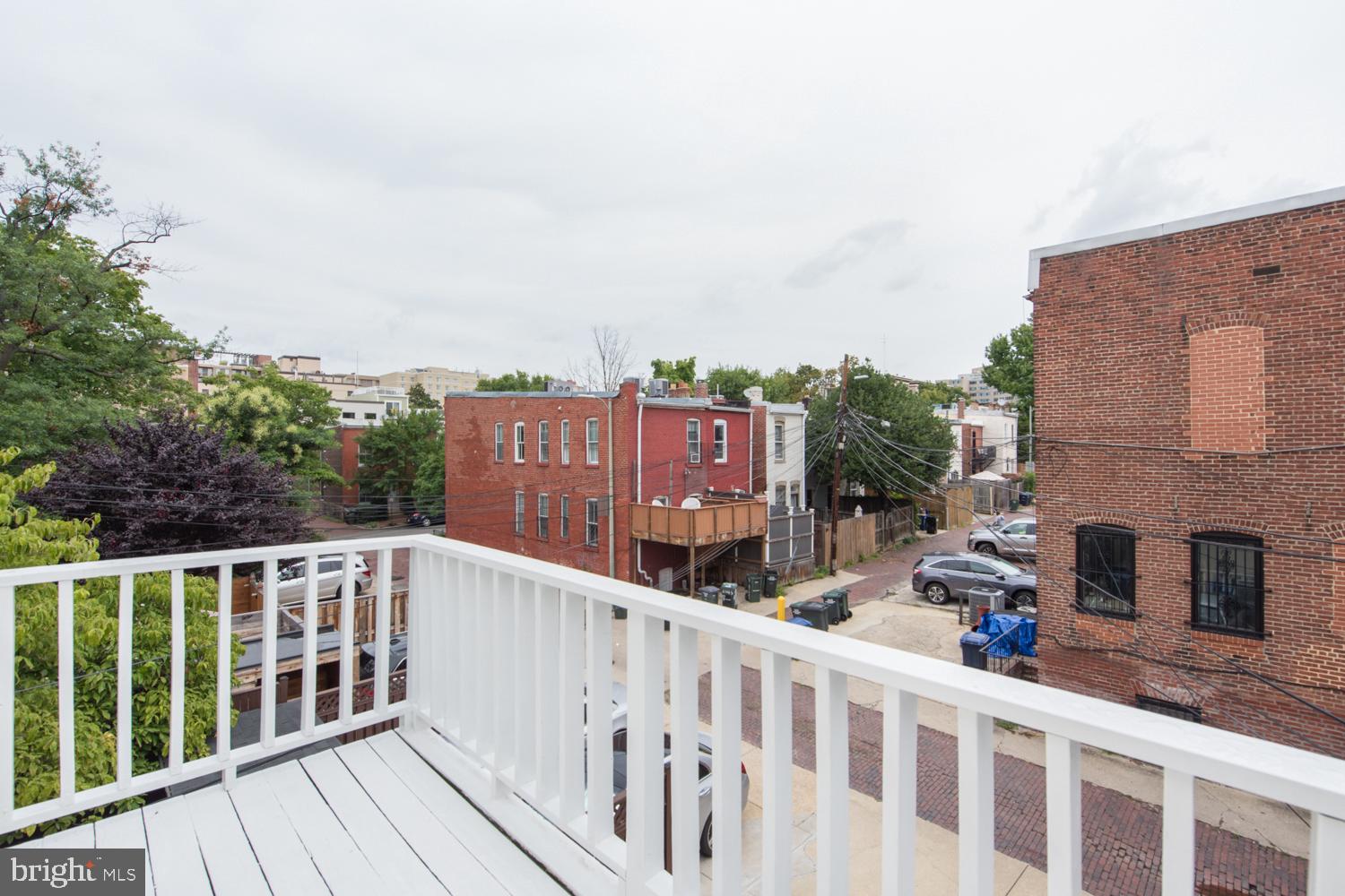 1307 22nd Street Northwest Washington, DC 20037 - Photo 11 of 46 a view of a building from a balcony