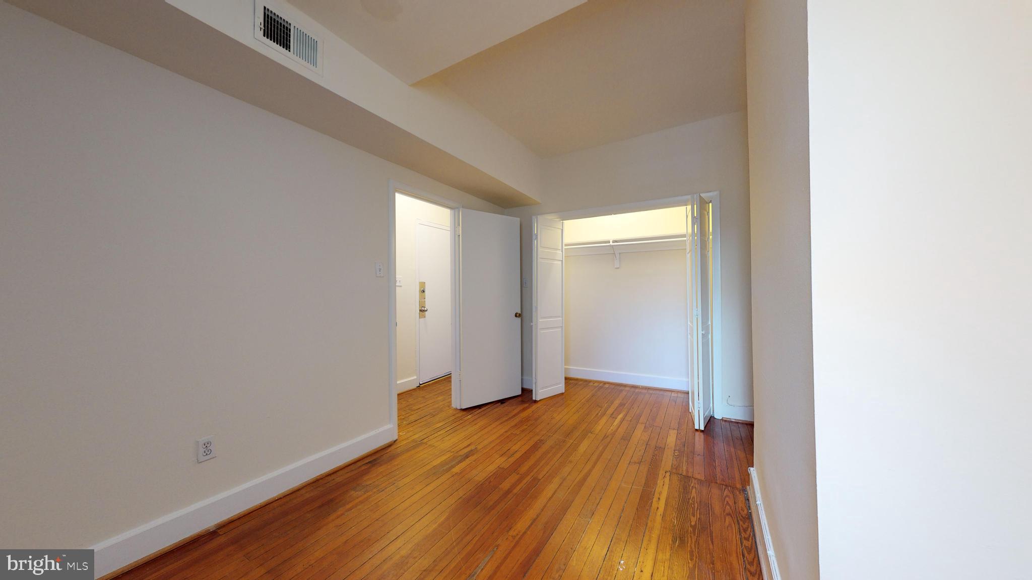 1307 22nd Street Northwest Washington, DC 20037 - Photo 14 of 46 a view of a room with wooden floor
