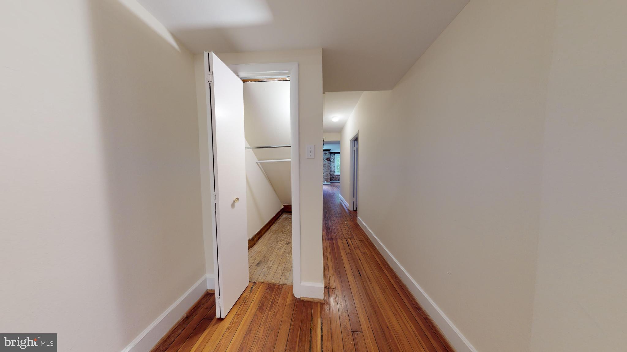 1307 22nd Street Northwest Washington, DC 20037 - Photo 15 of 46 a view of a hallway with wooden floor and staircase