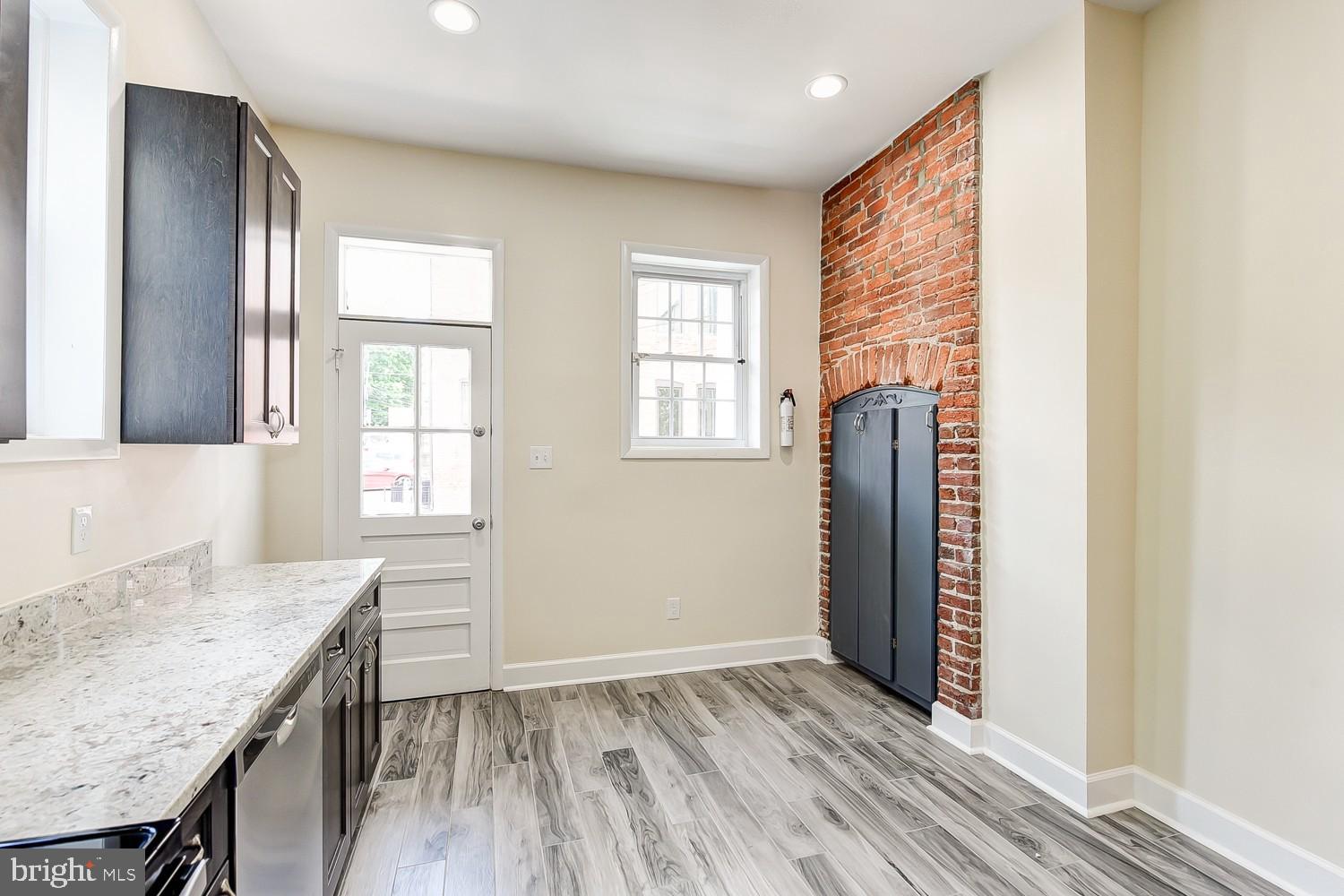 1307 22nd Street Northwest Washington, DC 20037 - Photo 23 of 46 an entryway with wooden floor and cabinet
