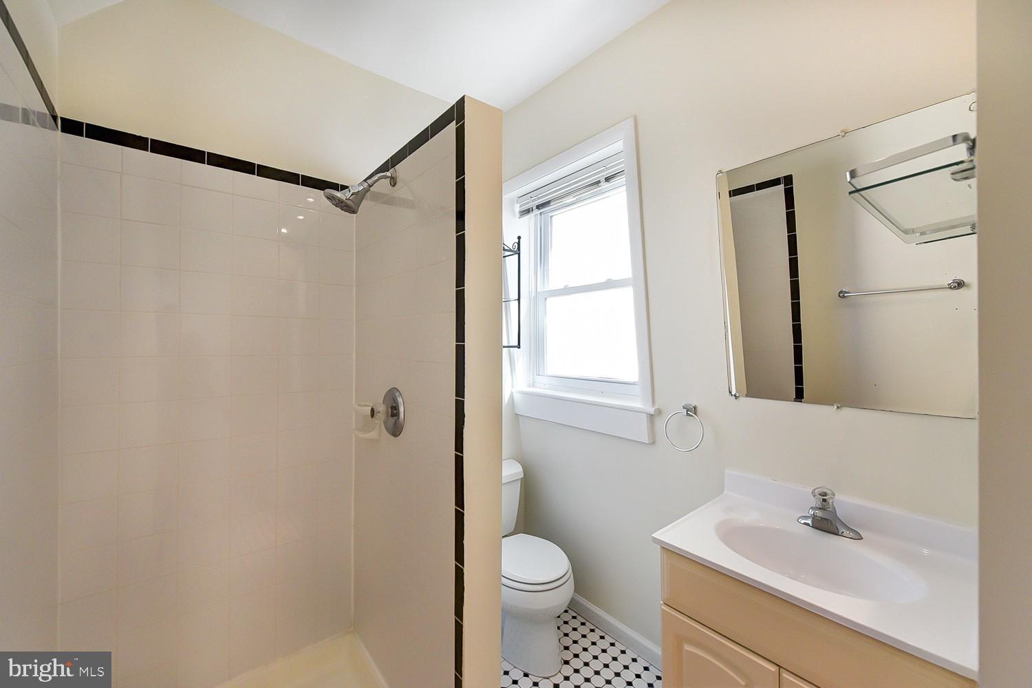 1307 22nd Street Northwest Washington, DC 20037 - Photo 37 of 46 a bathroom with a sink toilet and shower