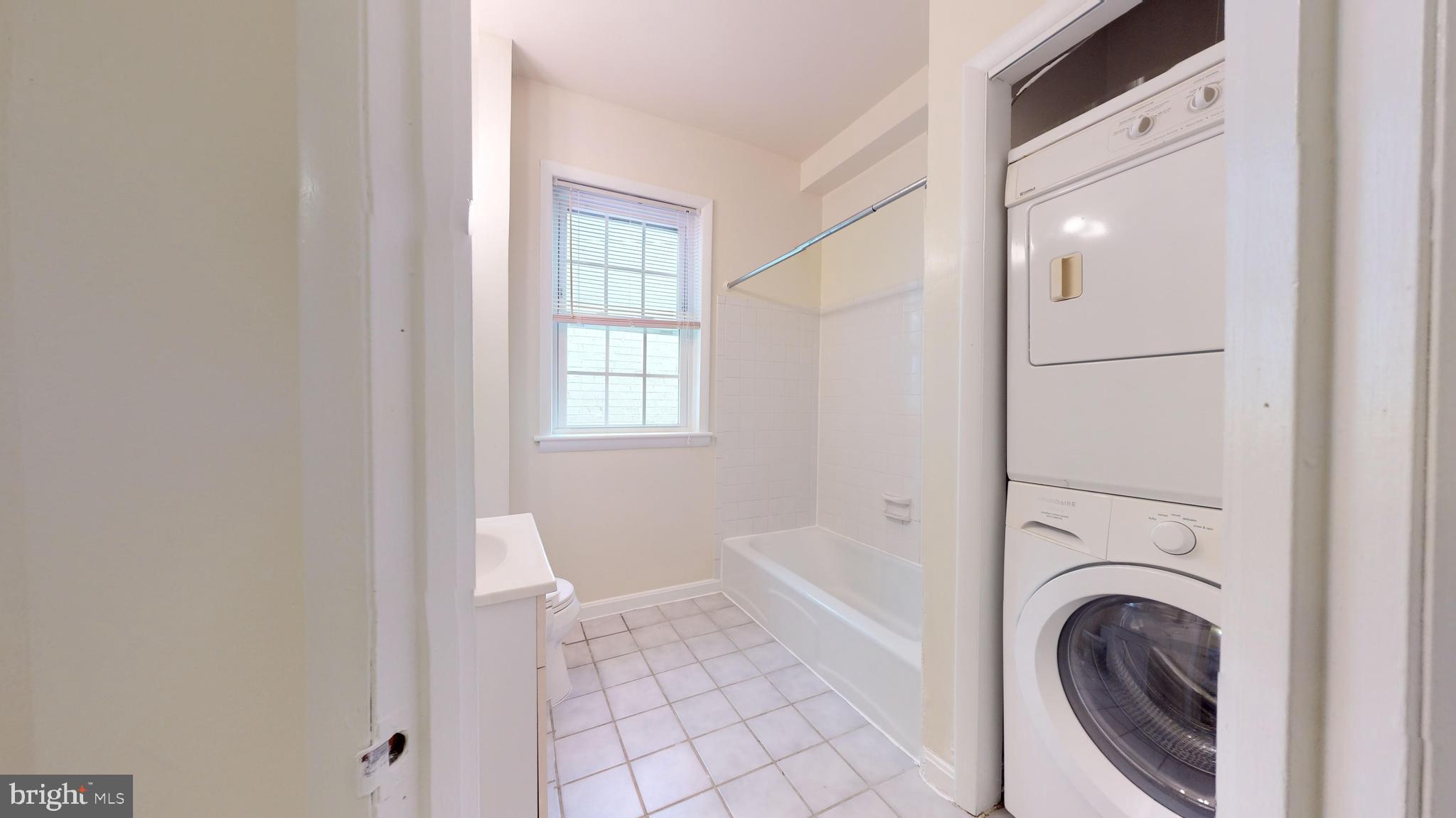 1307 22nd Street Northwest Washington, DC 20037 - Photo 7 of 46 a view of a bathroom with bathtub and shower