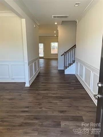 6100 Trinity Xing Circle Kannapolis, NC 28081 - Photo 2 of 25 a view of entryway and hall with wooden floor
