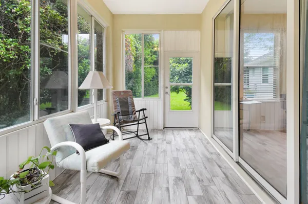a living room with furniture and a window