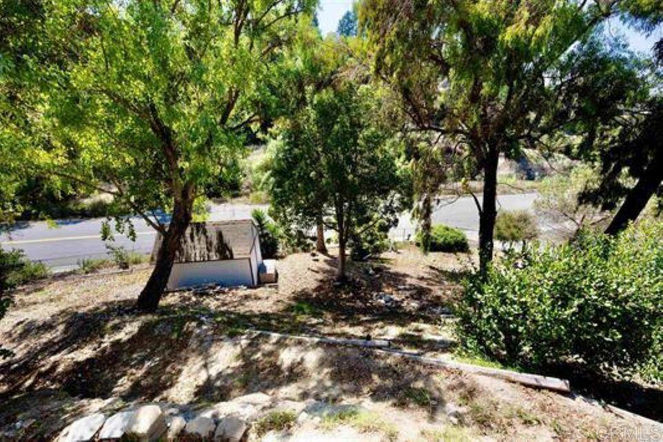 2277 Dunstan Street Oceanside, CA 92054 - Photo 31 of 36 a front view of a house with a yard