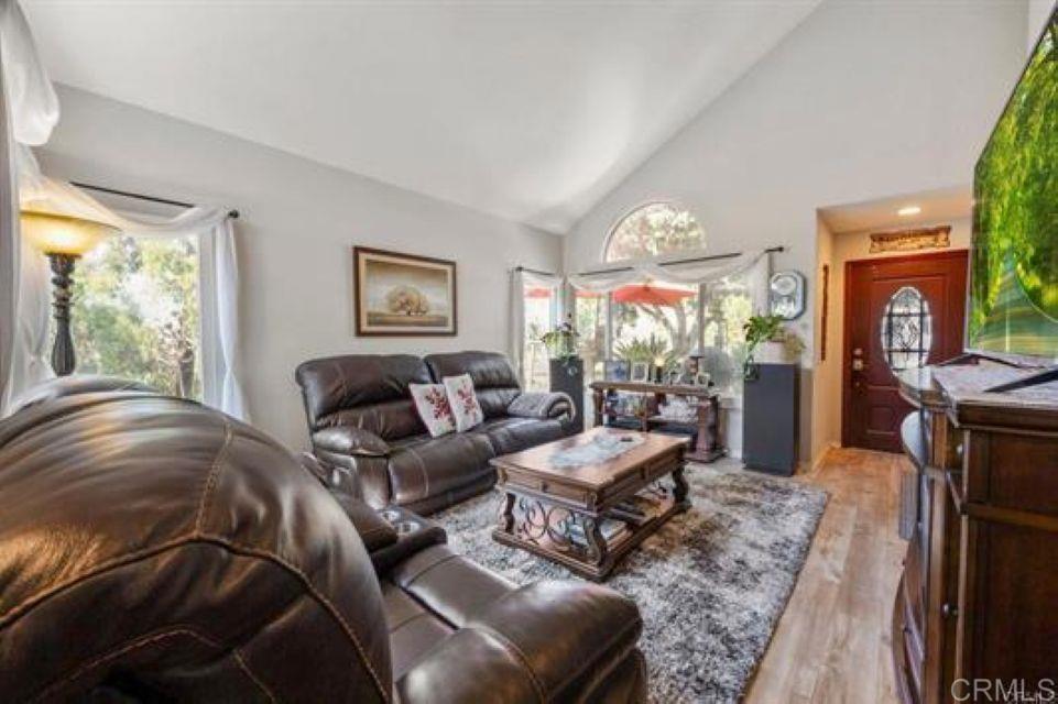 2277 Dunstan Street Oceanside, CA 92054 - Photo 5 of 36 a living room with furniture and a large window