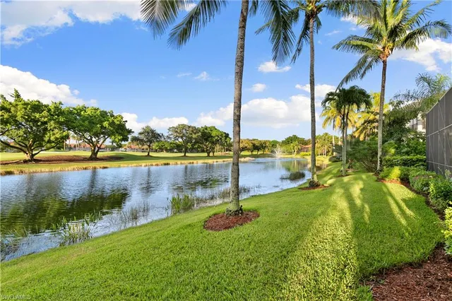 a view of a lake with a big yard