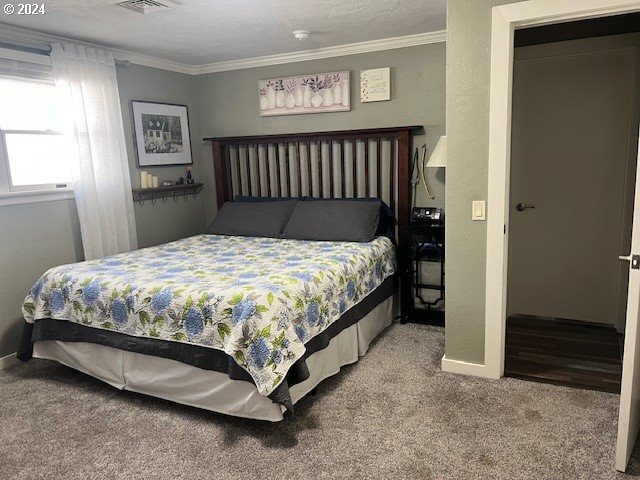 187 Greenvale Drive Springfield, OR 97477 - Photo 16 of 36 a bed sitting in a bedroom next to a window