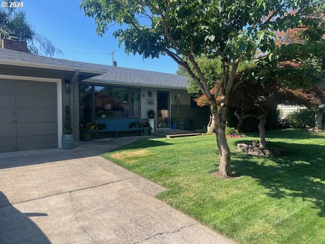 187 Greenvale Drive Springfield, OR 97477 - Photo 2 of 36 a view of a house with a backyard
