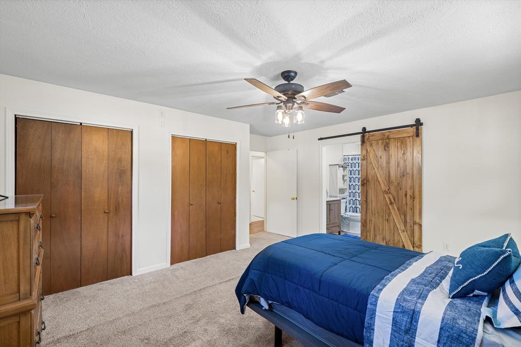 913 Doe Run Road Tool, TX 75143 - Photo 15 of 38 Primary bedroom and ensuite bathroom
