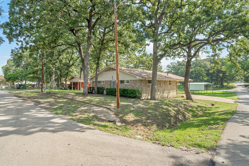 913 Doe Run Road Tool, TX 75143 - Photo 25 of 38 On a corner lot in a quaint neighborhood full of beautiful hardwoods.