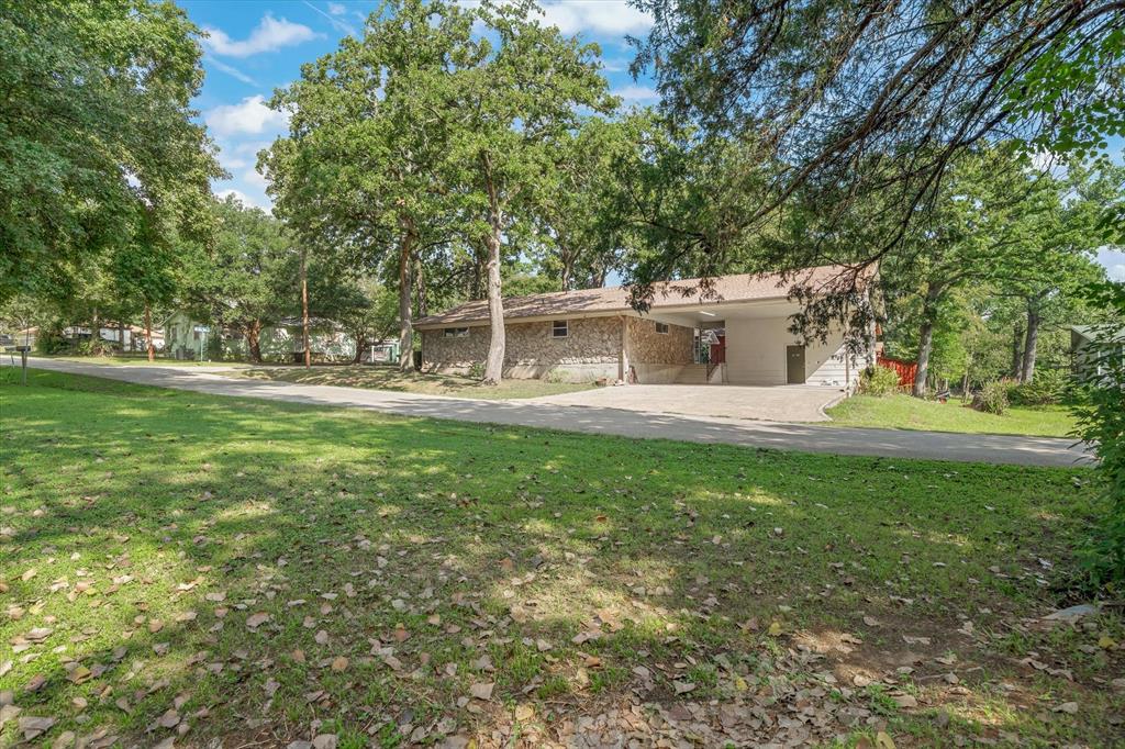 913 Doe Run Road Tool, TX 75143 - Photo 27 of 38 This lot, across the street and looking at the back side of the house, is included in the sale. In all, there are three parcels that make up this property.