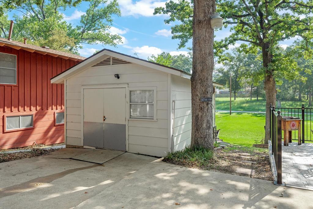 913 Doe Run Road Tool, TX 75143 - Photo 29 of 38 A detached garage for you car, boat, fishing gear, or yard equipment