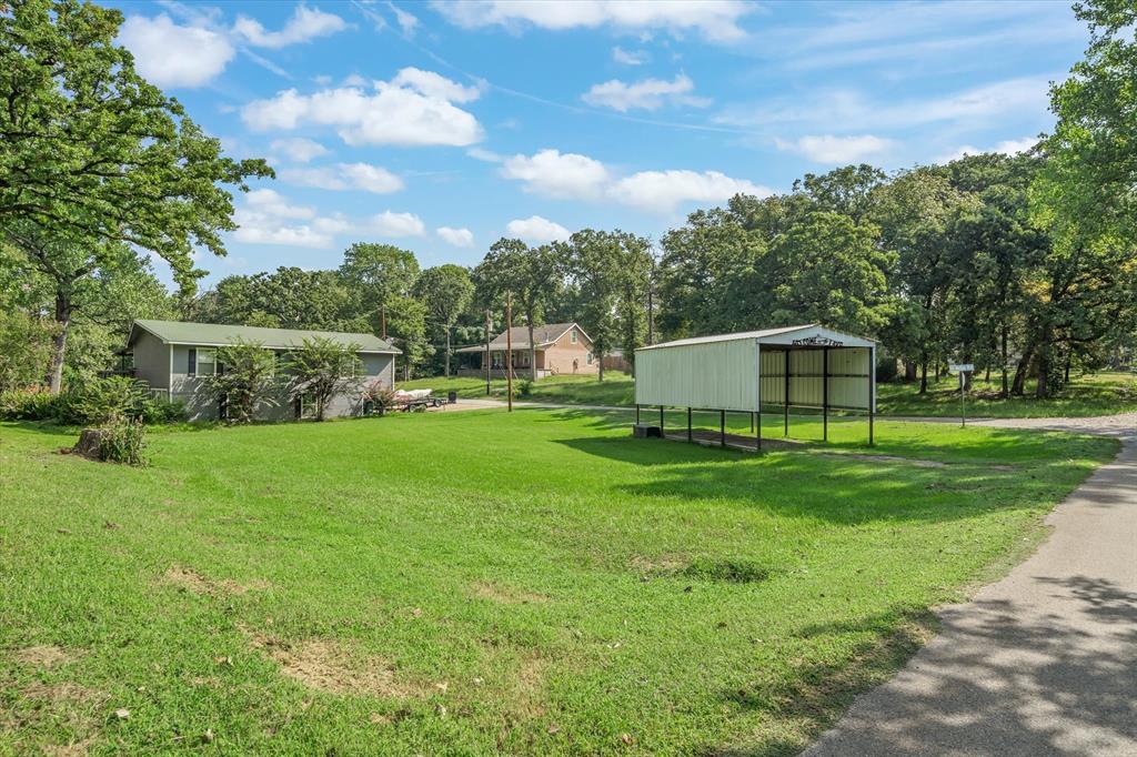 913 Doe Run Road Tool, TX 75143 - Photo 30 of 38 This lot is included in the sale and adds additional space for recreation and for parking your RV.