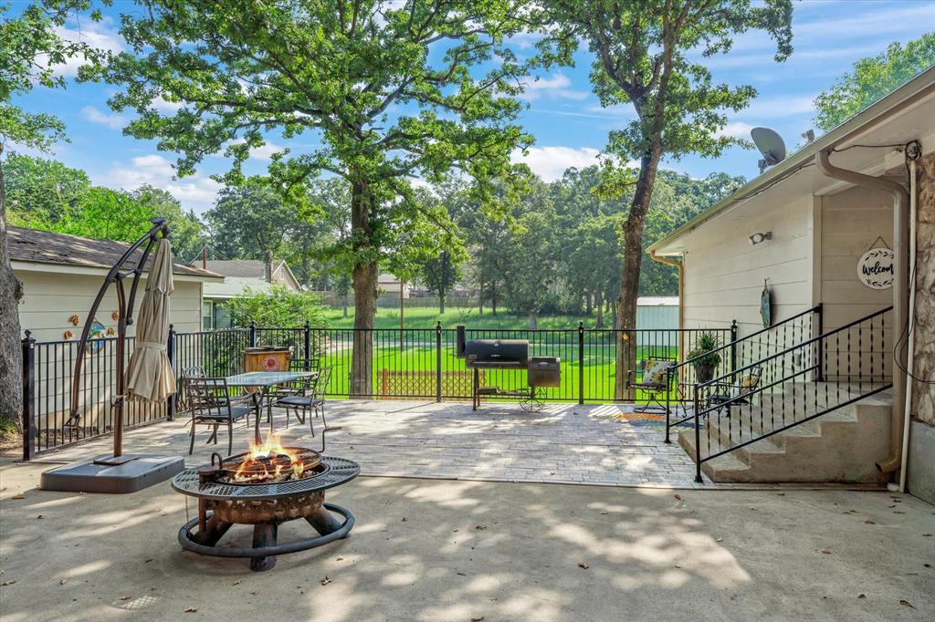 913 Doe Run Road Tool, TX 75143 - Photo 6 of 38 This patio is a year-round party waiting to happen! Shaded in the summer, with room for your fire pit and hot tub in the winter -- this property has that lake vibe you've been looking for!