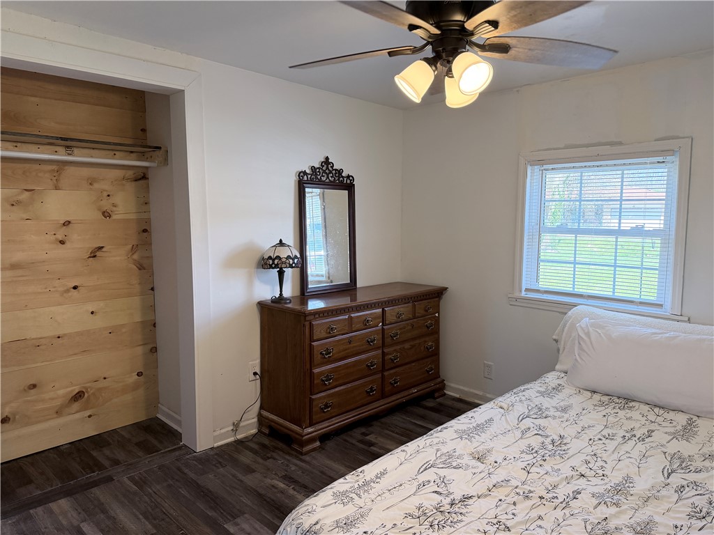 6800 Farmington Road Miamisburg, OH 45342 - Photo 15 of 32 This cozy bedroom features durable flooring and a bright window, offering comfort and style.