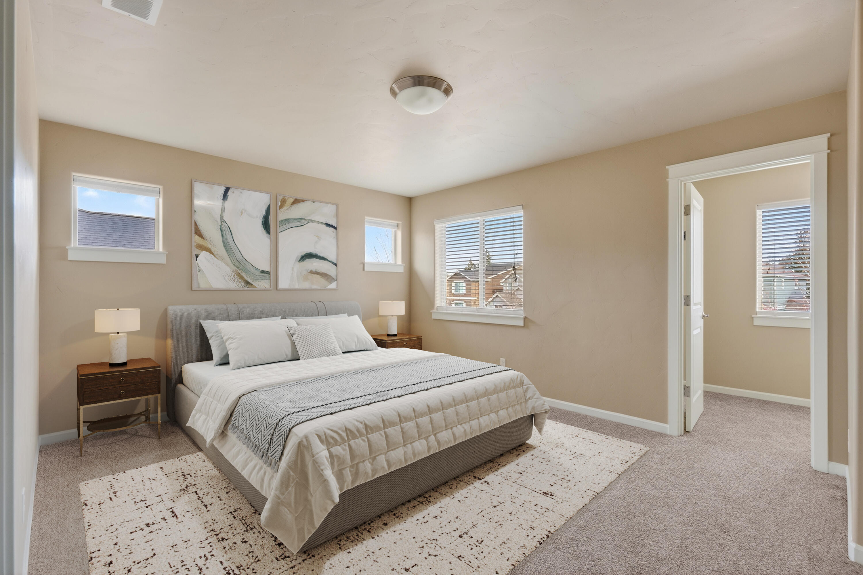 3365 Southwest 28th Street Redmond, OR 97756 - Photo 19 of 39 a bedroom with a bed and a painting on the wall