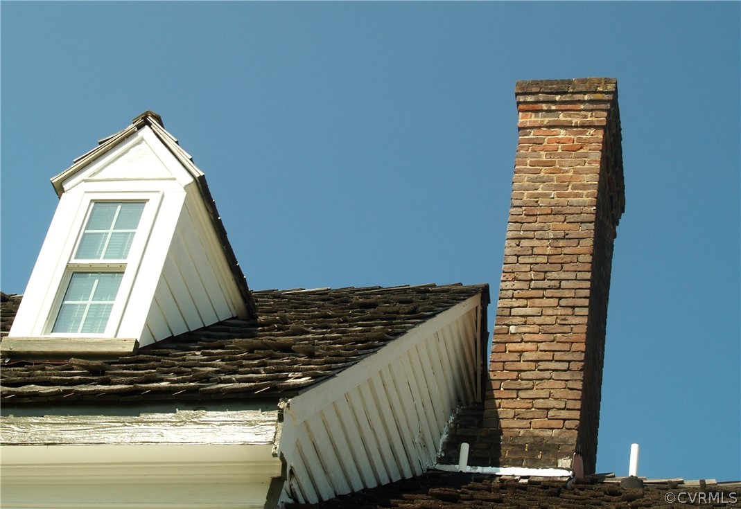11221 Carriage Road Providence Forge, VA 23140 - Photo 44 of 44 Common Bond Brick in Chimney above Roof Ridge