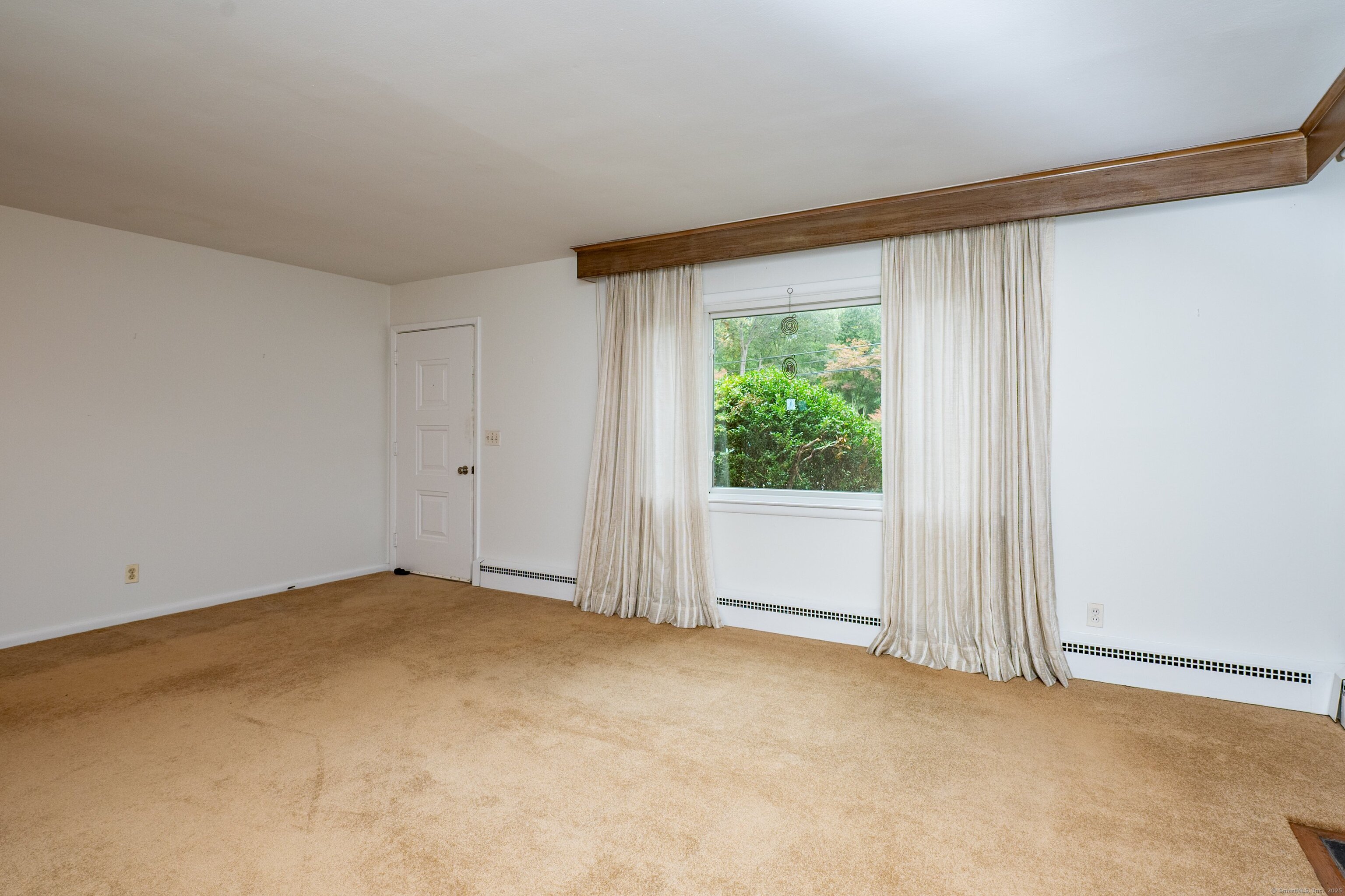 588 Summit Drive Orange, CT 06477 - Photo 11 of 40 a view of an empty room with a window