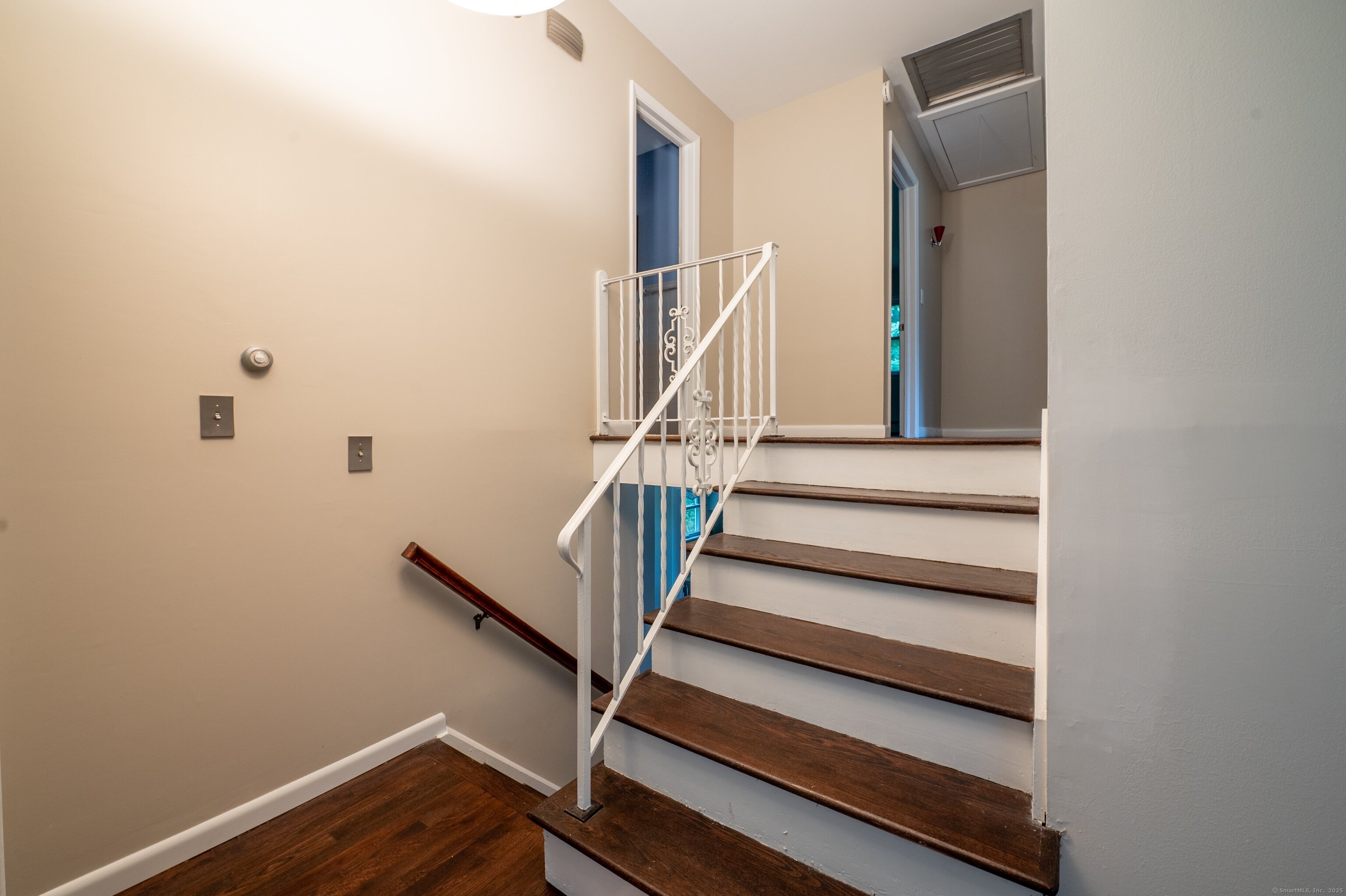 588 Summit Drive Orange, CT 06477 - Photo 16 of 40 a view of entryway with wooden floor