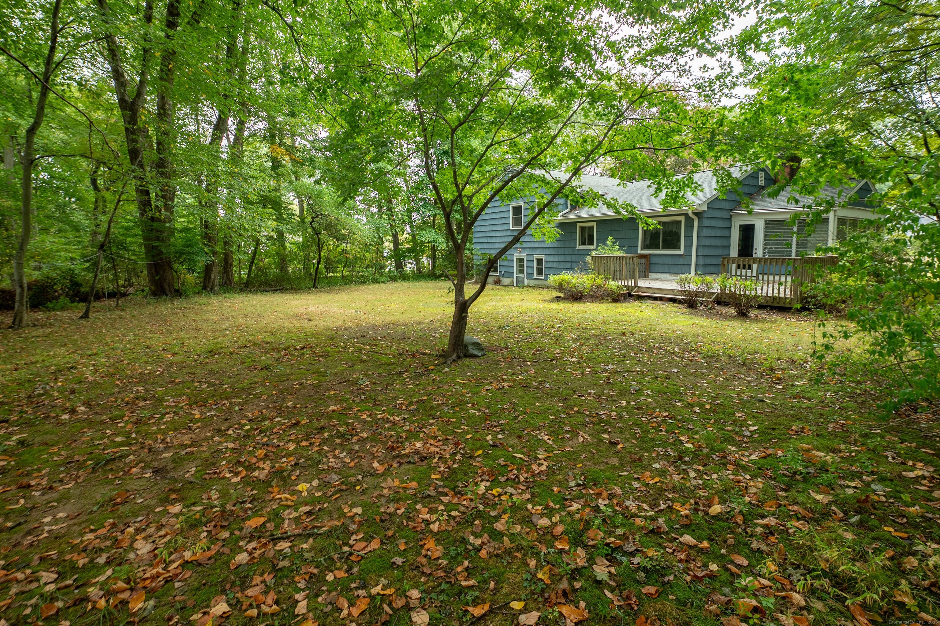 588 Summit Drive Orange, CT 06477 - Photo 18 of 40 a view of a backyard with swimming pool