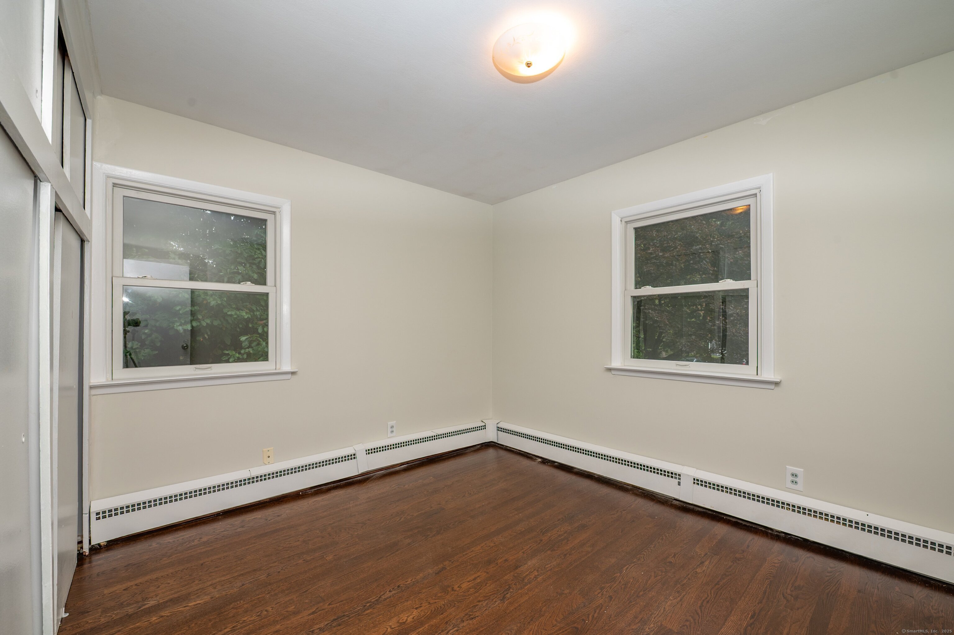 588 Summit Drive Orange, CT 06477 - Photo 25 of 40 an empty room with a window