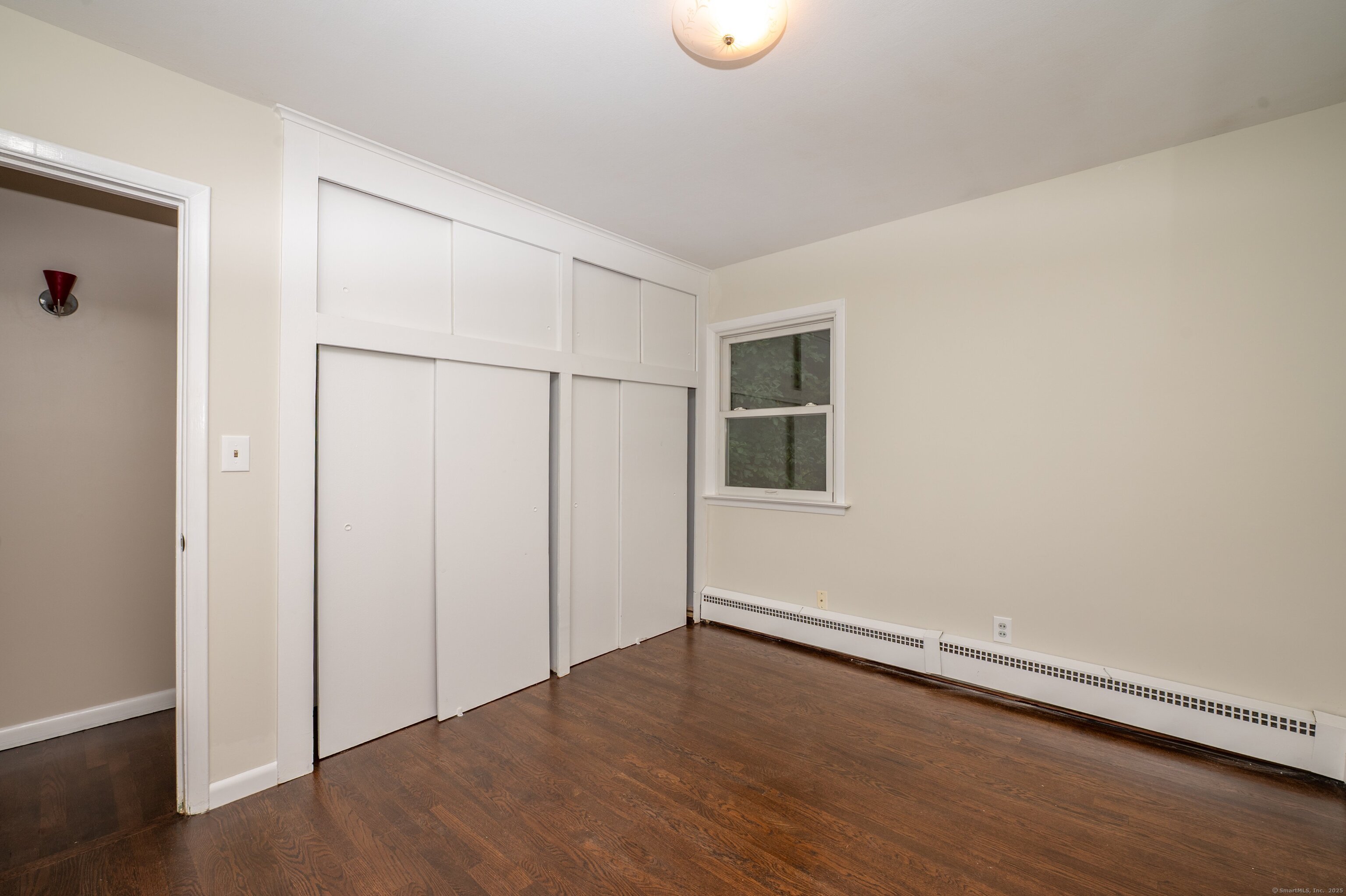 588 Summit Drive Orange, CT 06477 - Photo 26 of 40 wooden floor in an empty room