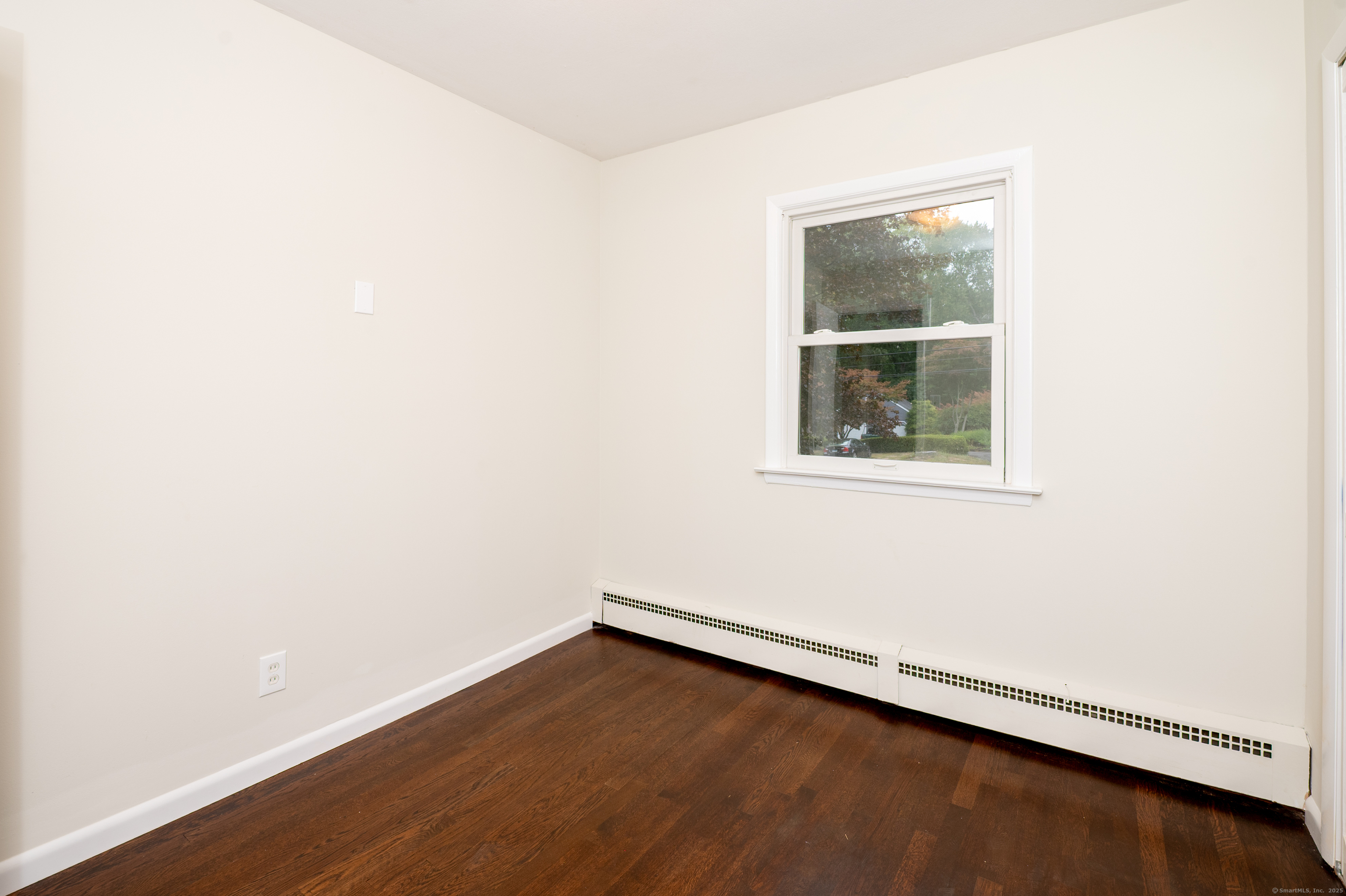 588 Summit Drive Orange, CT 06477 - Photo 29 of 40 an empty room with a window