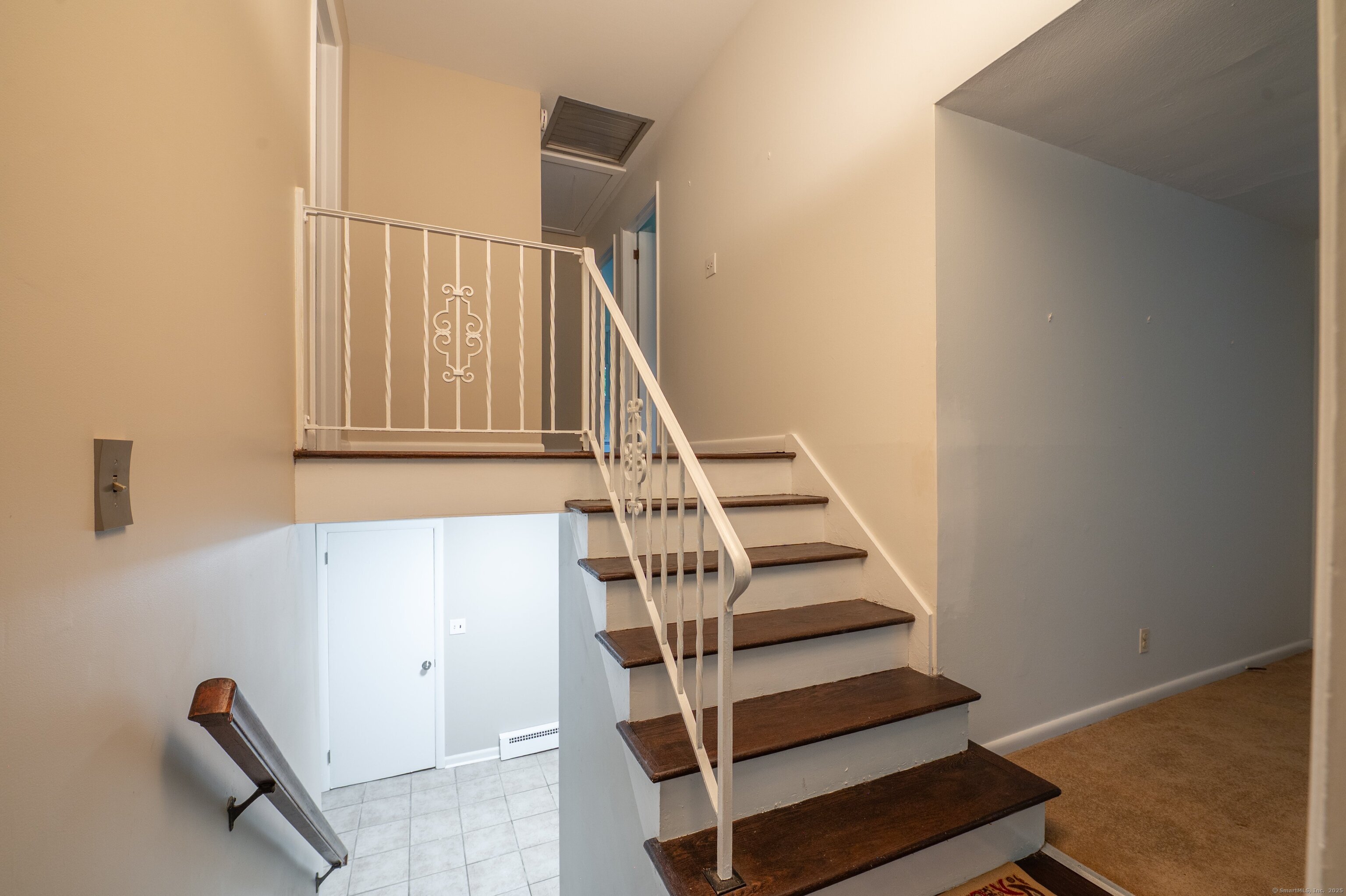 588 Summit Drive Orange, CT 06477 - Photo 30 of 40 a view of entryway with wooden floor