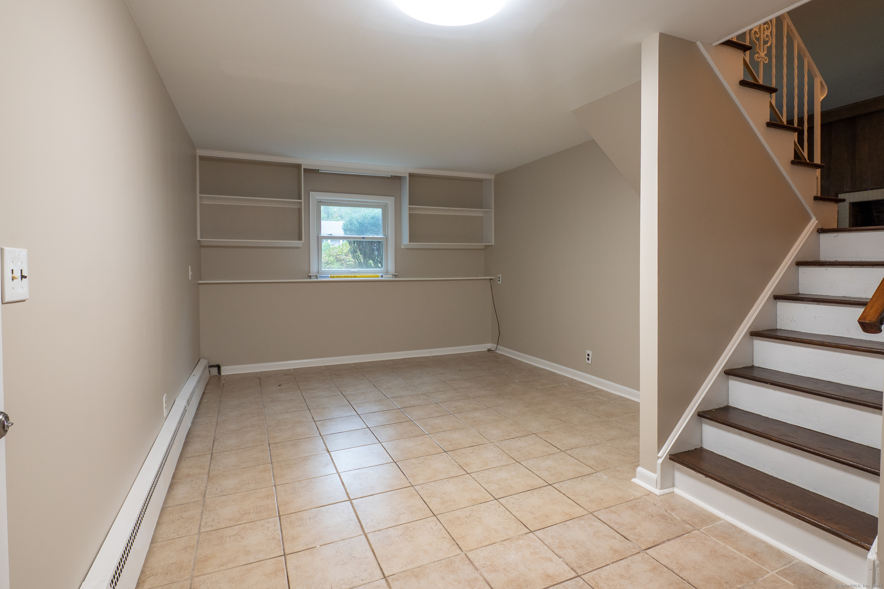 588 Summit Drive Orange, CT 06477 - Photo 31 of 40 an empty room with windows