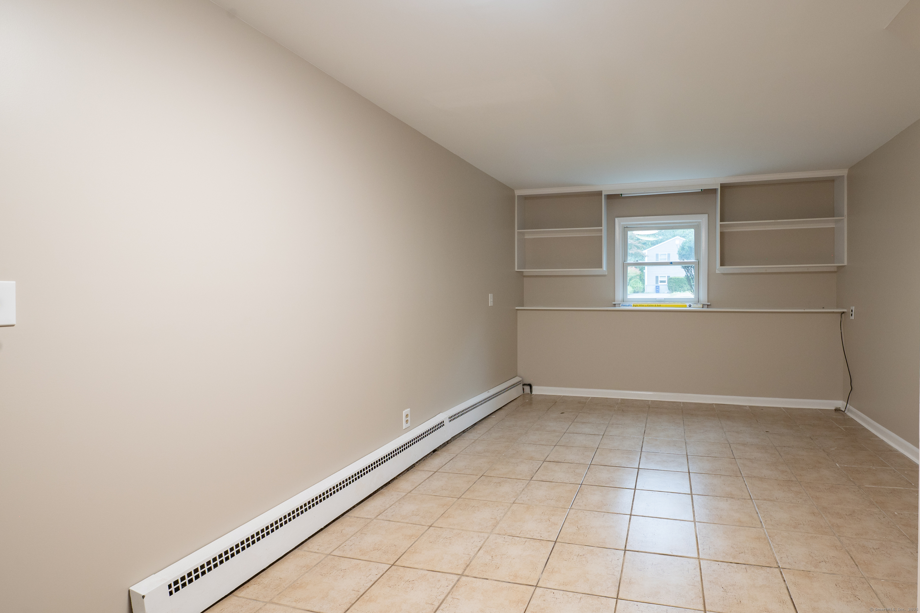 588 Summit Drive Orange, CT 06477 - Photo 33 of 40 an empty room with windows