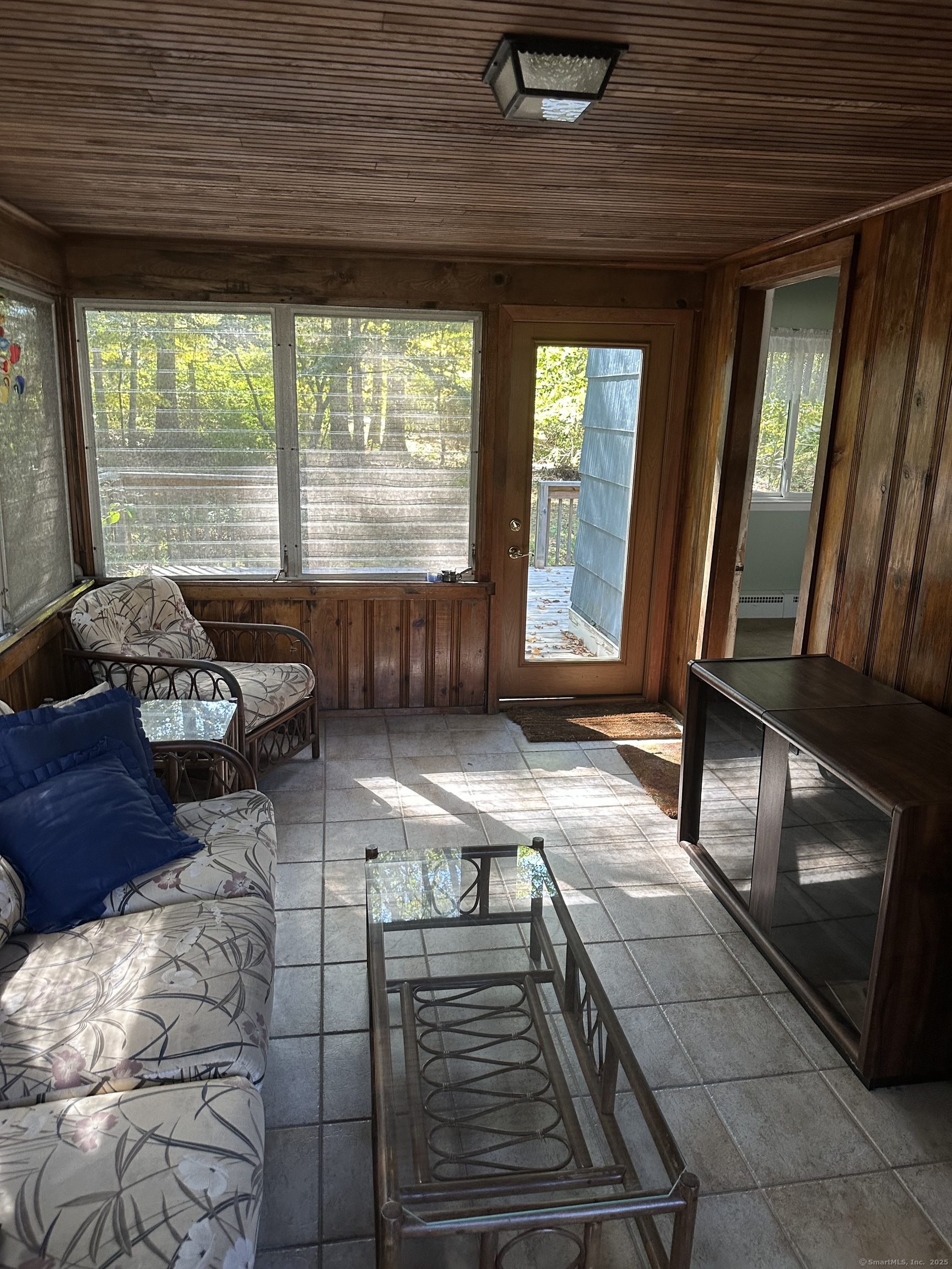 588 Summit Drive Orange, CT 06477 - Photo 5 of 40 a living room with furniture and a fireplace