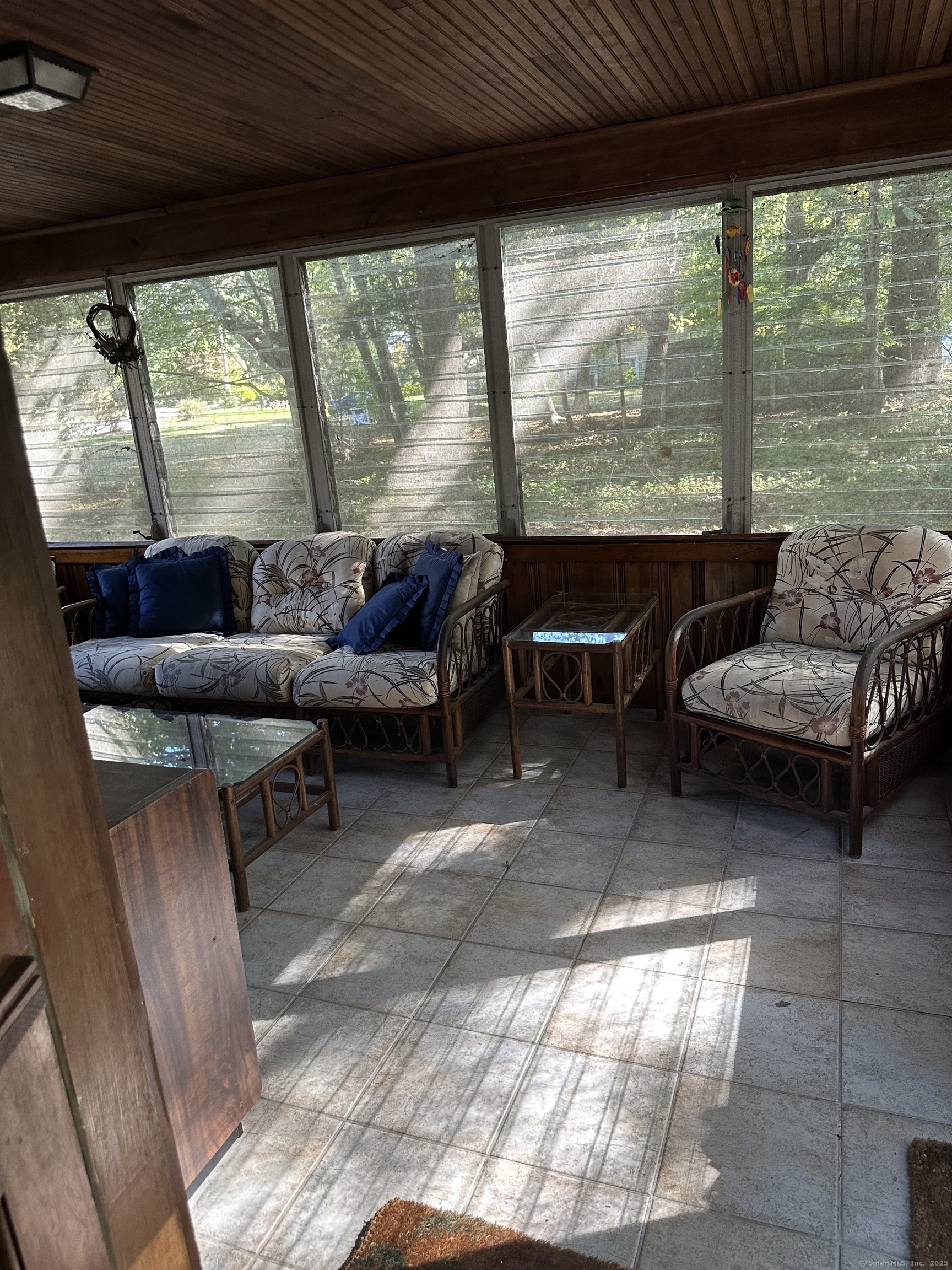 588 Summit Drive Orange, CT 06477 - Photo 7 of 40 a living room with furniture and a large window