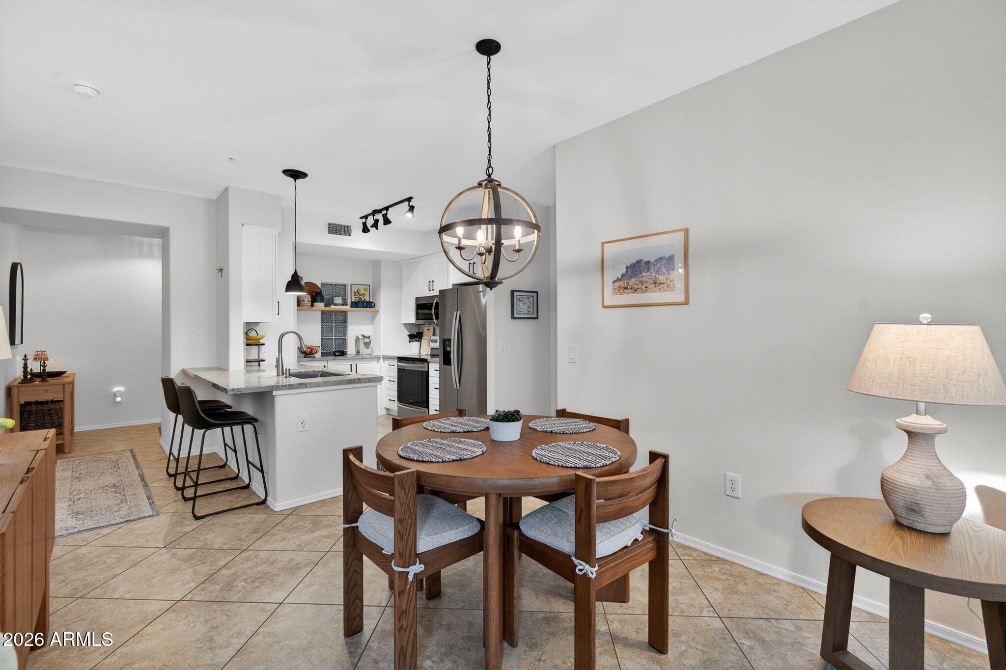 435 West Rio Salado Parkway, Unit 204 Tempe, AZ 85281 - Photo 10 of 60 a view of a dining room with furniture